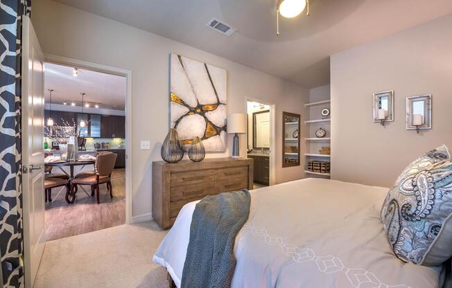 a bedroom with a large bed in a room