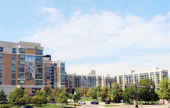 a view of a city with buildings and trees