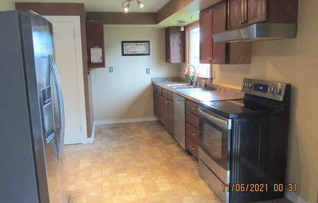 Large home on .26 acre Lot ! 4 BR 2 bth + garage + shed _+ AC ~ Great Neighborhood !