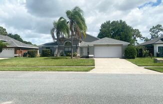 Spacious 3 Bedroom/2 Bath home in a gated community at Meadow Woods Village in Orlando Florida