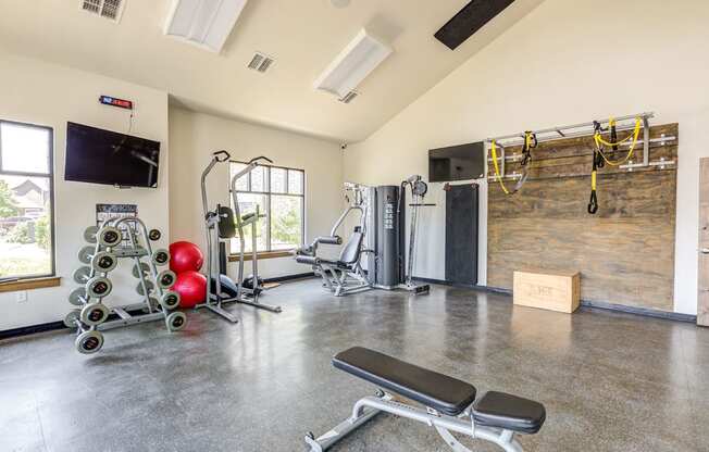 Fitness Center with cardio machines and strength training equipment