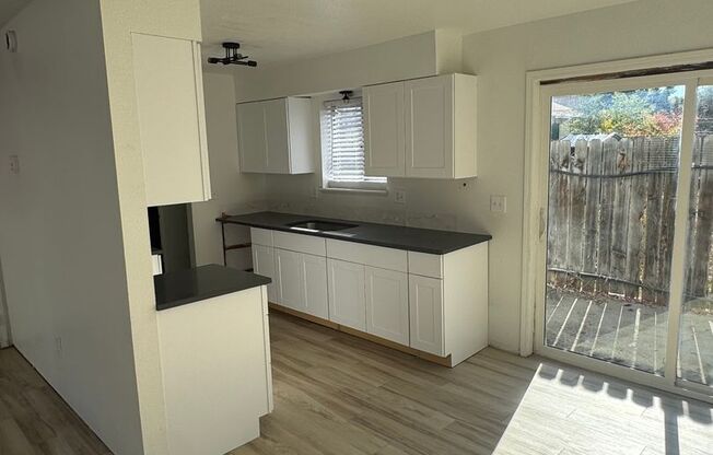 Fully Remodeled 3 Bedroom, 1 Bath duplex with yard and garage of 12th!