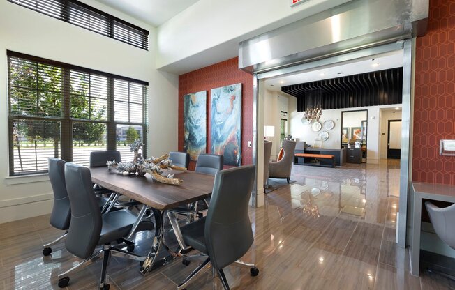 a dining room with a wooden table and chairs at North Creek, Texas, 78634
