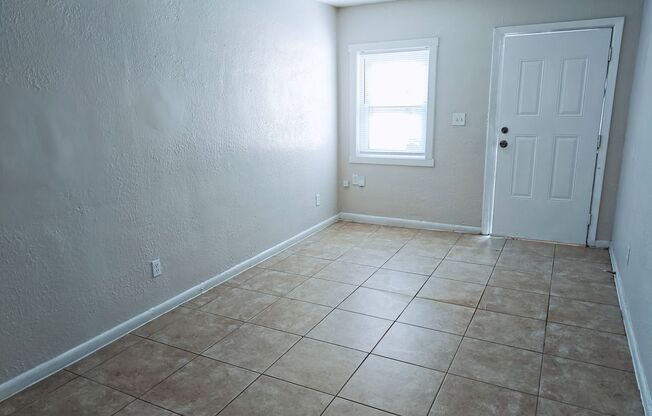 Just Renovated & Move-In Ready! 2BR/1BA Duplex on W 6th St – Pets Welcome!