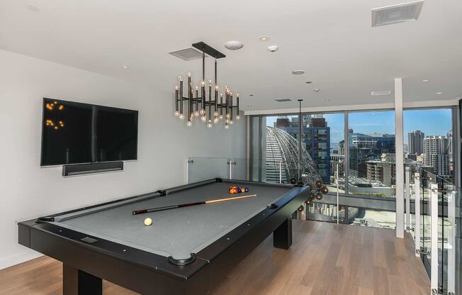 billiards in club lounge at K1 Apartments, San Diego, CA 92101