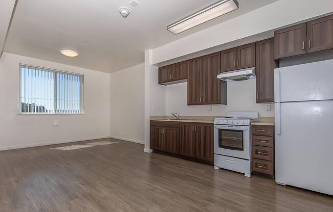 a kitchen with a wood floor