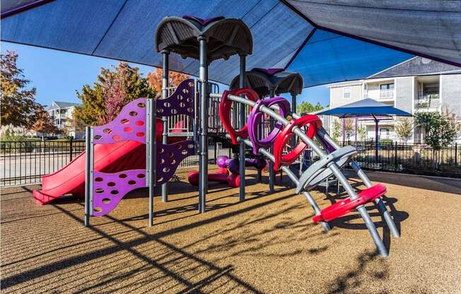 our playground is equipped with a variety of equipment including slides and swings