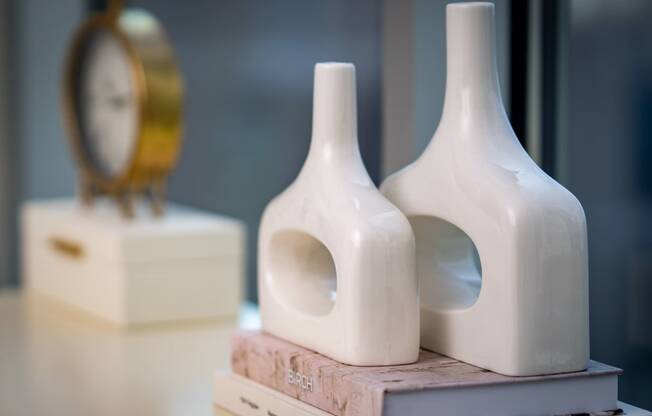 a pair of white vases