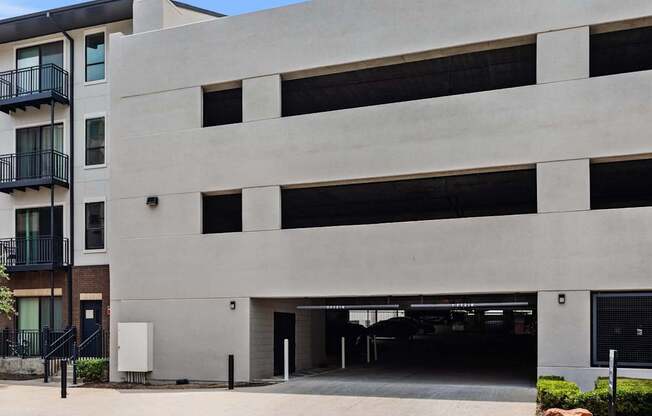 A modern building with a large garage door.
