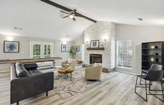 A living room with a fireplace and a couch.