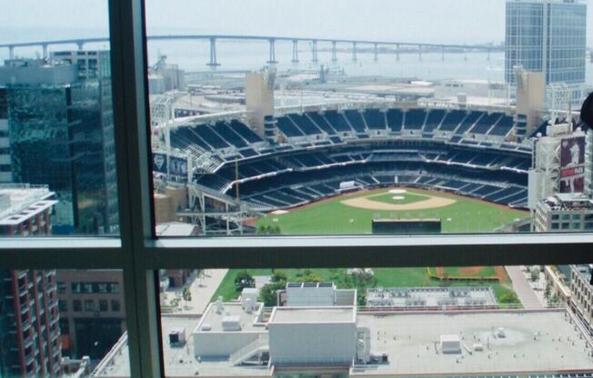 Luxurious 2 Bedroom / 2 Bath 25th story condo with 2 parking spaces***Unbelievable Views of Petco Park***