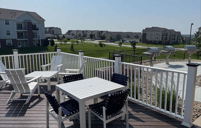 A deck off the community building overlooking grills at Andover Pointe Apartment Homes, La Vista, NE, 68138