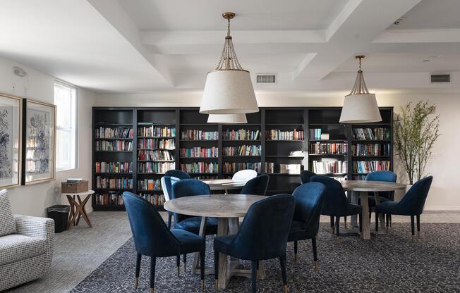 a living room filled with furniture and a table
