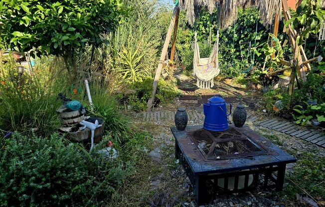 Reduced! Peaceful 2 Bed/1 Bath Craftsman Bungalow w/ Expansive Self Sustaining Garden