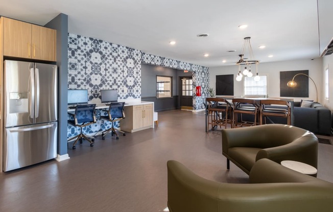 an open living room and kitchen with a dining room table and chairs