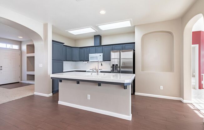 European Parc one-level home w/private rear yard backing to ponding basin