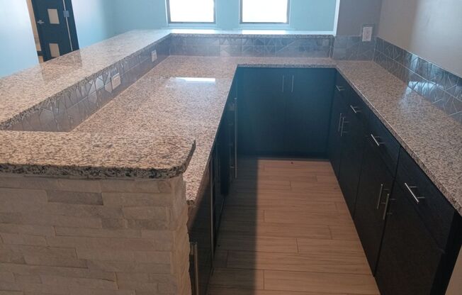 Luxurious 2 bedroom, 2 bathroom condo located in downtown ABQ! ALL utilities included!