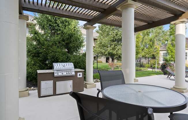 The Fairways at Corbin Park poolside cabana with BBQ grill and seating