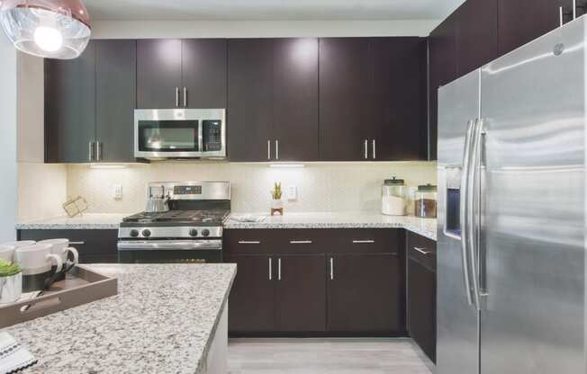 Dark kitchen scheme at Centra Midtown Apartments