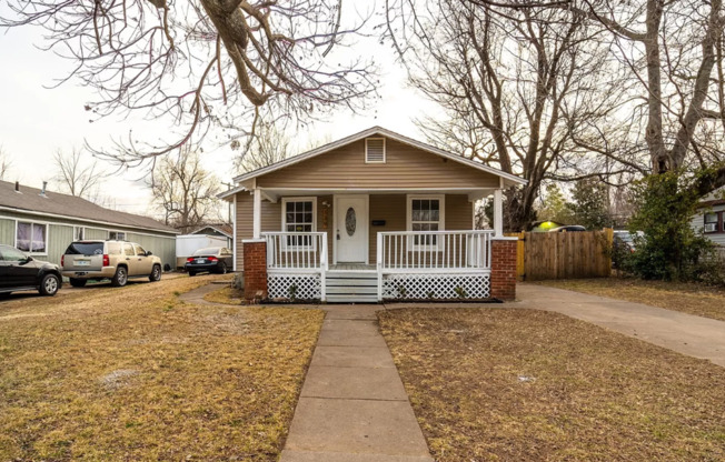 2 Bed, 1 Bath Home with Charming Porch and Spacious Yard