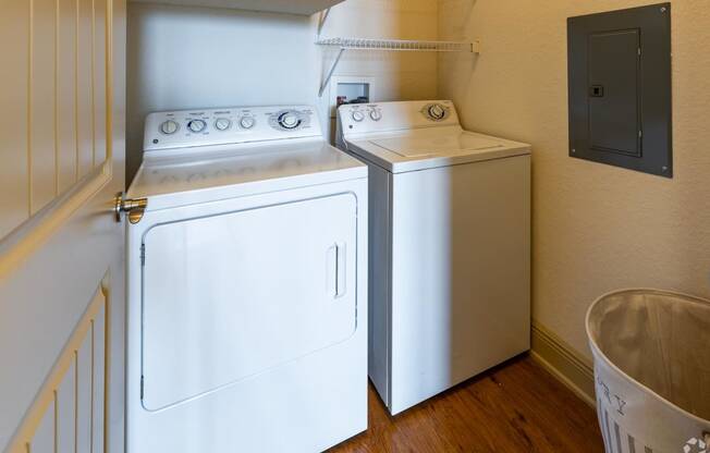 a laundry room with a washer and dryer