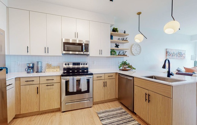 Kitchen with cabinets at CityLine Apartments, Minneapolis, 55406