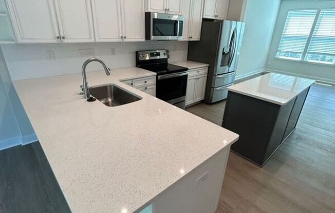 Modern, Sleek, and Luxurious Townhome Coming Soon!