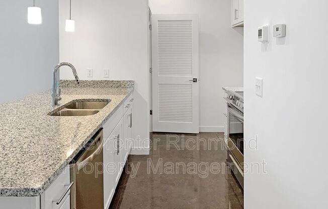 114 W 12 ST 