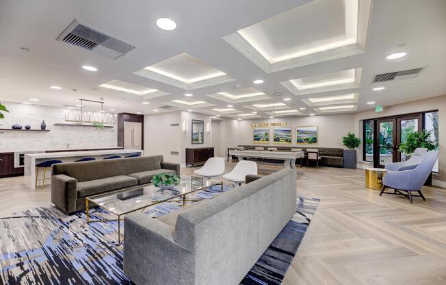 a room filled with furniture and a large window