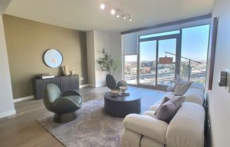 Gorgeous 1 Bedroom Condo at Axis with Den