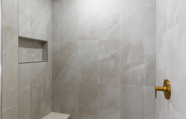 Premium homes feature extra indulgences as well, including hand shower systems in five-piece bathrooms