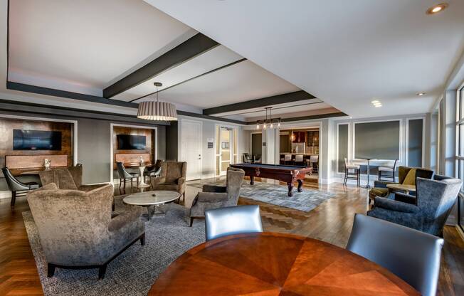 Resident Clubroom with Billiards, Lounge Area, and Flat Screen TVs