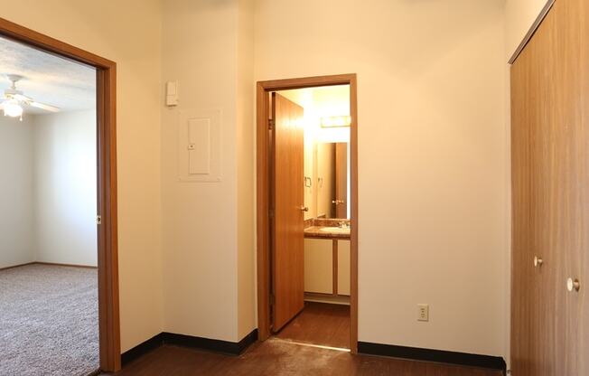 Bedroom With Ceiling Fan And Separate Bathroom at Abbington Village Apartments, Ohio