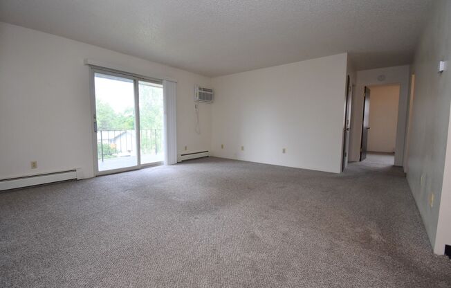 2 Bed 1 Bath Top-Floor Apartment w/ Private Deck