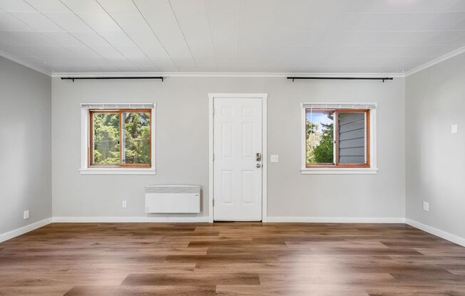 Charming 1 BD 1 BA cottage nestled on a beautifully landscaped lot