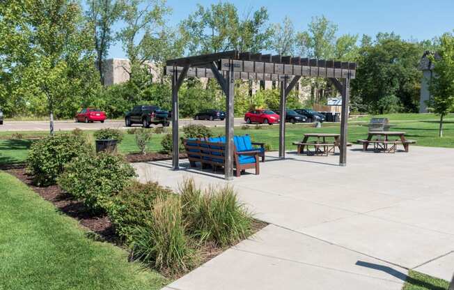 Outdoor Grill With Intimate Seating Area at Shoreview Grand with BBQ grills.