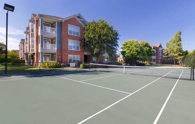 Belle Harbour Apartments outdoor lighted tennis court