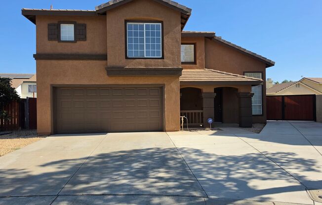 Welcome to Three Bedroom, Two in a half bath in Perris, CA!