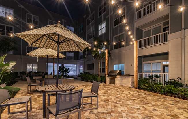 Outdoor Pool Sundeck Lit Up At Night