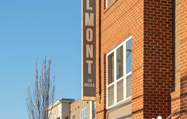 Exterior of four-story building with retail space available on the first floor