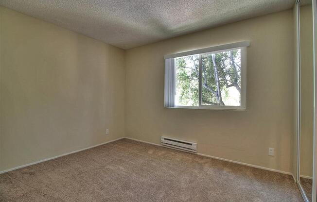 Bedroom with window at Boardwalk, Palo Alto