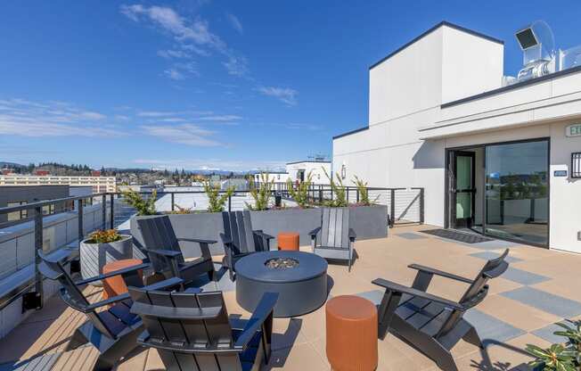 a terrace with a table and chairs on a sunny day at Marina Square, Washington