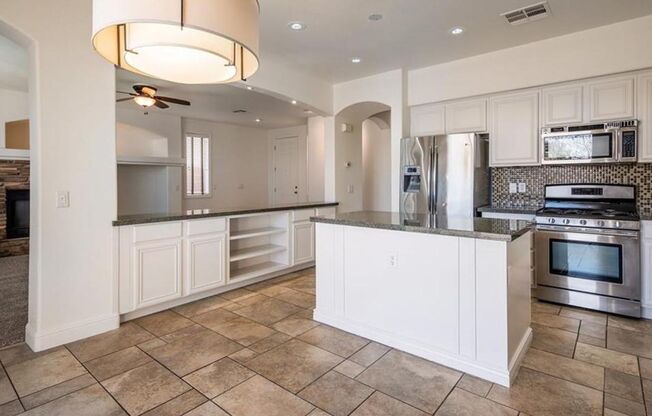 Kitchen has been upgraded and features modern appliances.