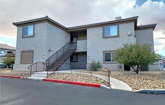 SECOND-FLOOR UNIT IN A GATED SOUTHWEST COMMUNITY