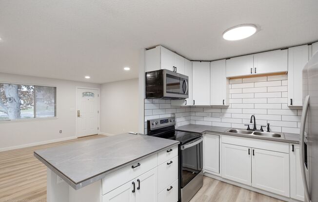 Remodeled 3 Bedroom 2 Bathroom Home, yard, carport