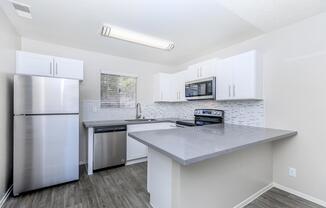 Quartz countertops in kitchen at Sunset Hills