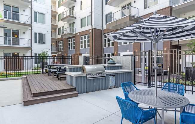 Outdoor Grill With Intimate Seating Area at Spoke Apartments, Atlanta, GA, 30307