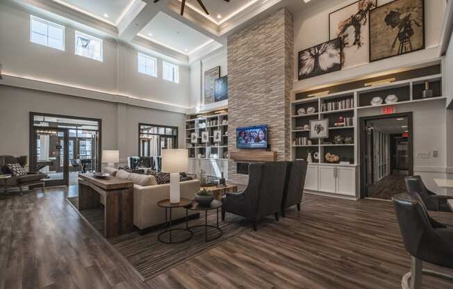 Large Clubhouse With Ample Sitting And Television at Abberly CenterPointe Apartment Homes by HHHunt, Midlothian, VA