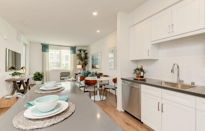 a kitchen with an island in the middle of a room