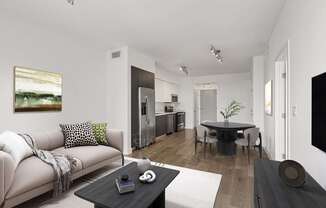 Spacious living area at MB Station apartments featuring modern finishes, abundant natural light, and a comfortable open floor plan near Coral Gables and Downtown Miami.